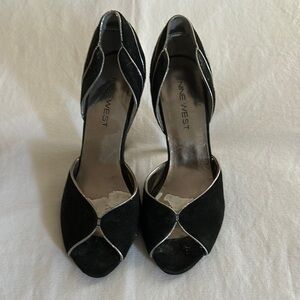 3.5” black suede heels with silver leather detailing.